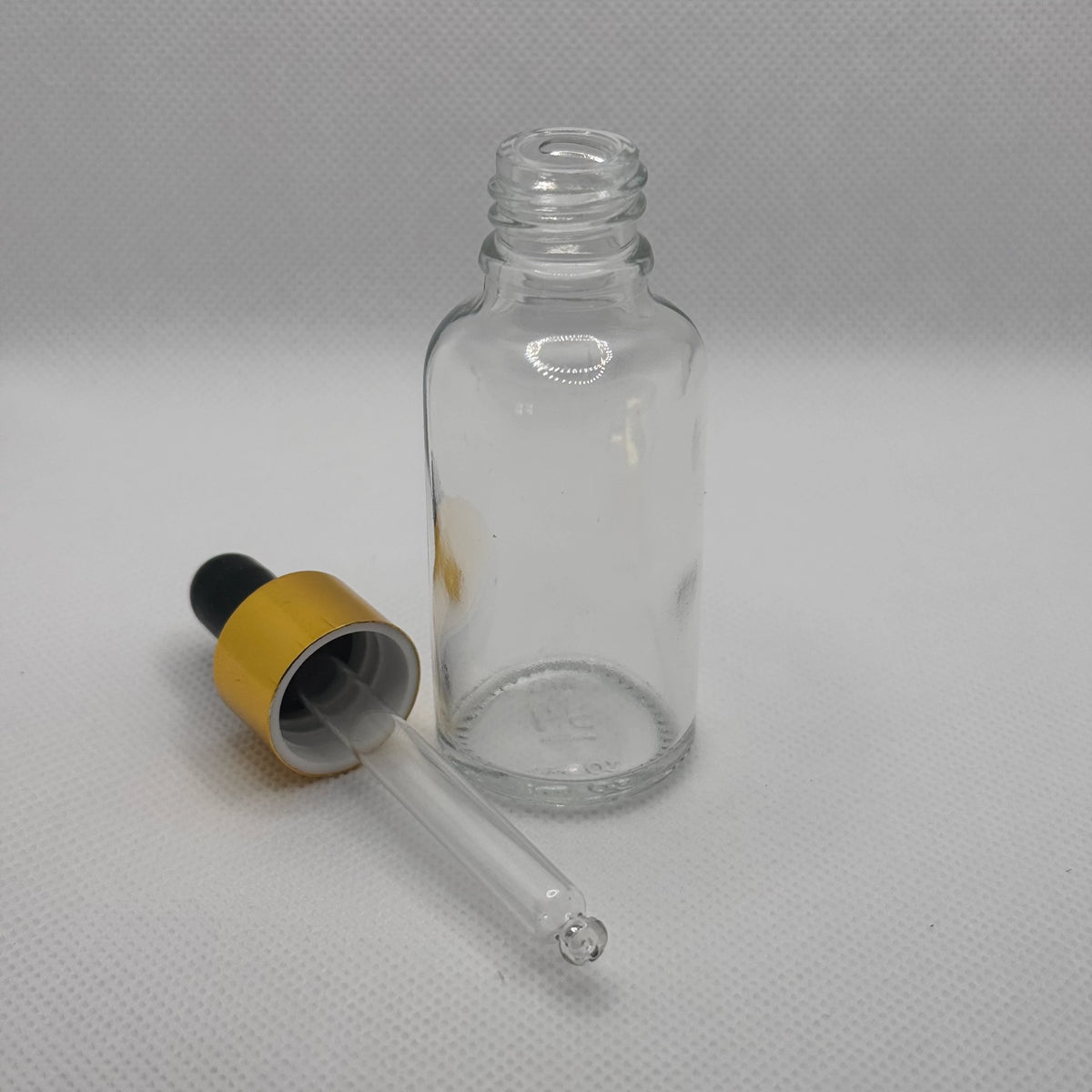 Glass Serum Bottle - Clear - Gold Dropper - 15mL with white background