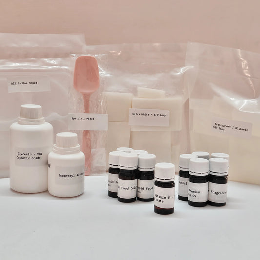 Assorted cosmetic bottles and packaging on a light pink background