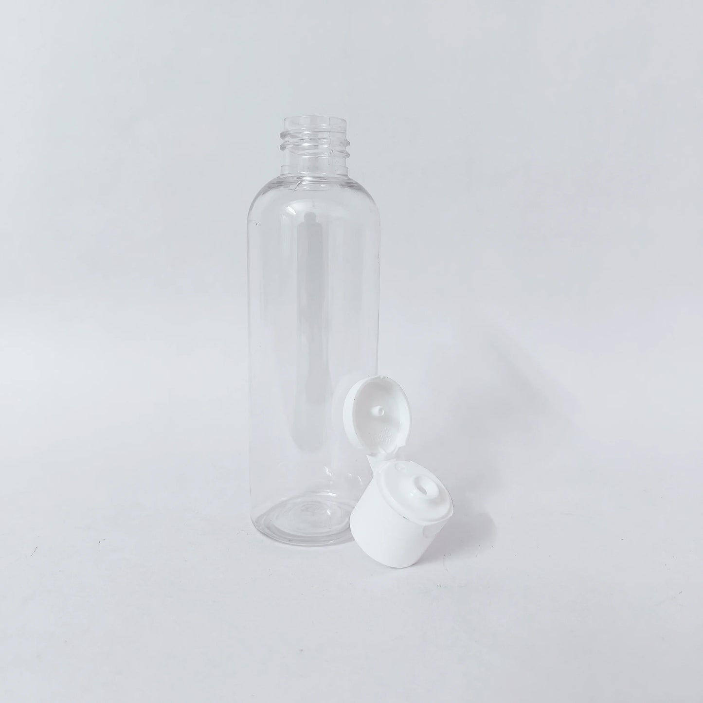PET Round Bottle - Clear - 20mm White Flip Cap - 100mL