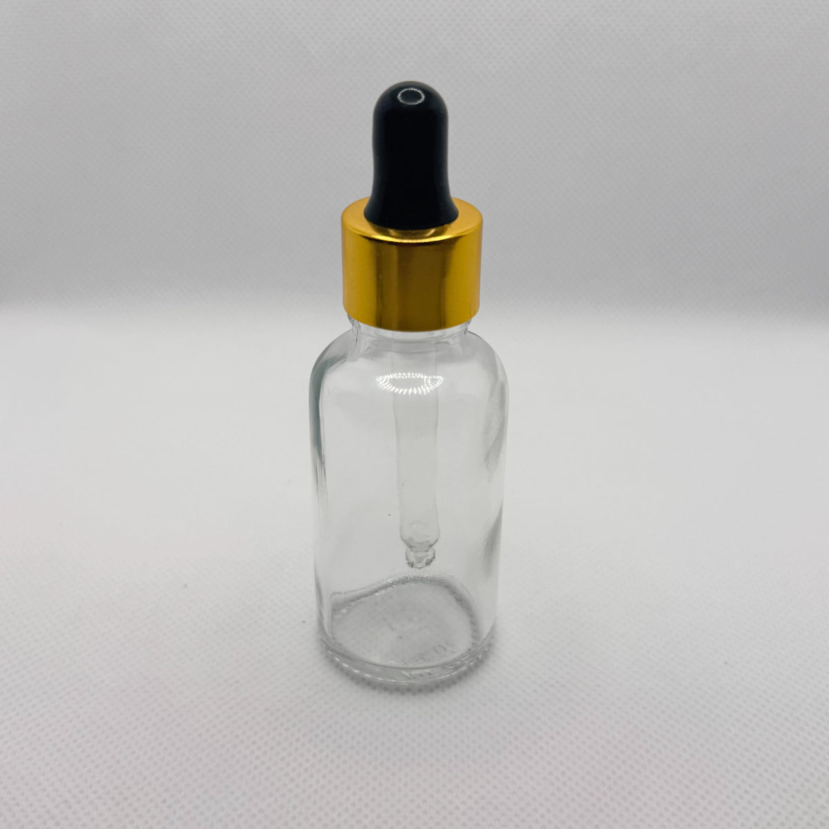Glass Serum Bottle - Clear - Gold Dropper - 15mL with white background