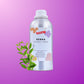 Bottle of Henna Extract Liquid with a plant on a purple background