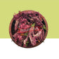 Dried Indian hibiscus flowers in a wooden bowl .