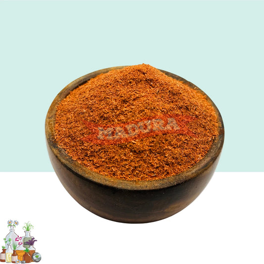 A wooden bowl with Manjista  Scrub Powder with White and Blue Background
