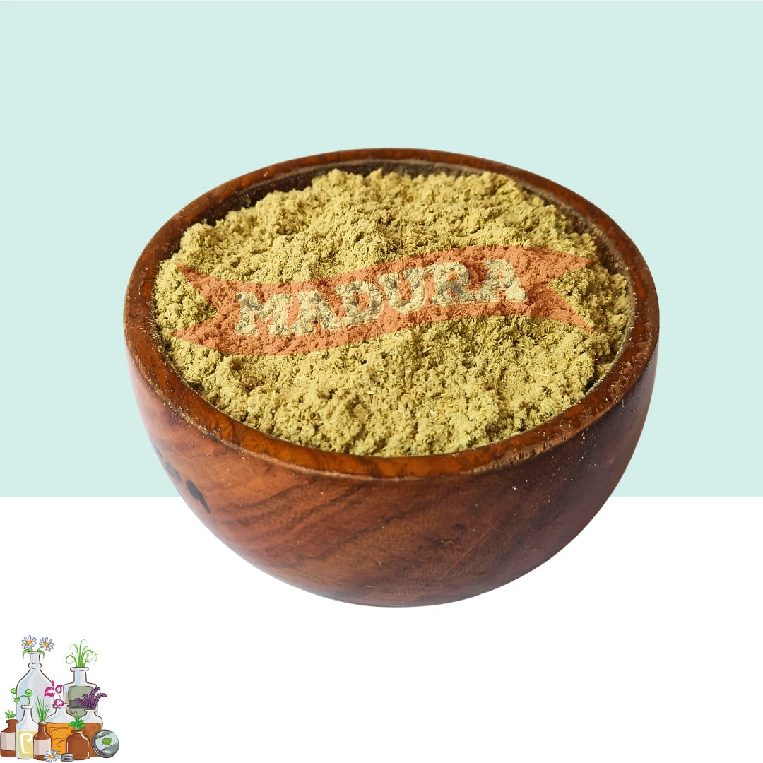 Wooden bowl filled with Marikolunthu Powder on a light blue background