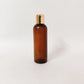 PET Round Bottle - Amber - 20mm Gold Flip Cap - 100mL