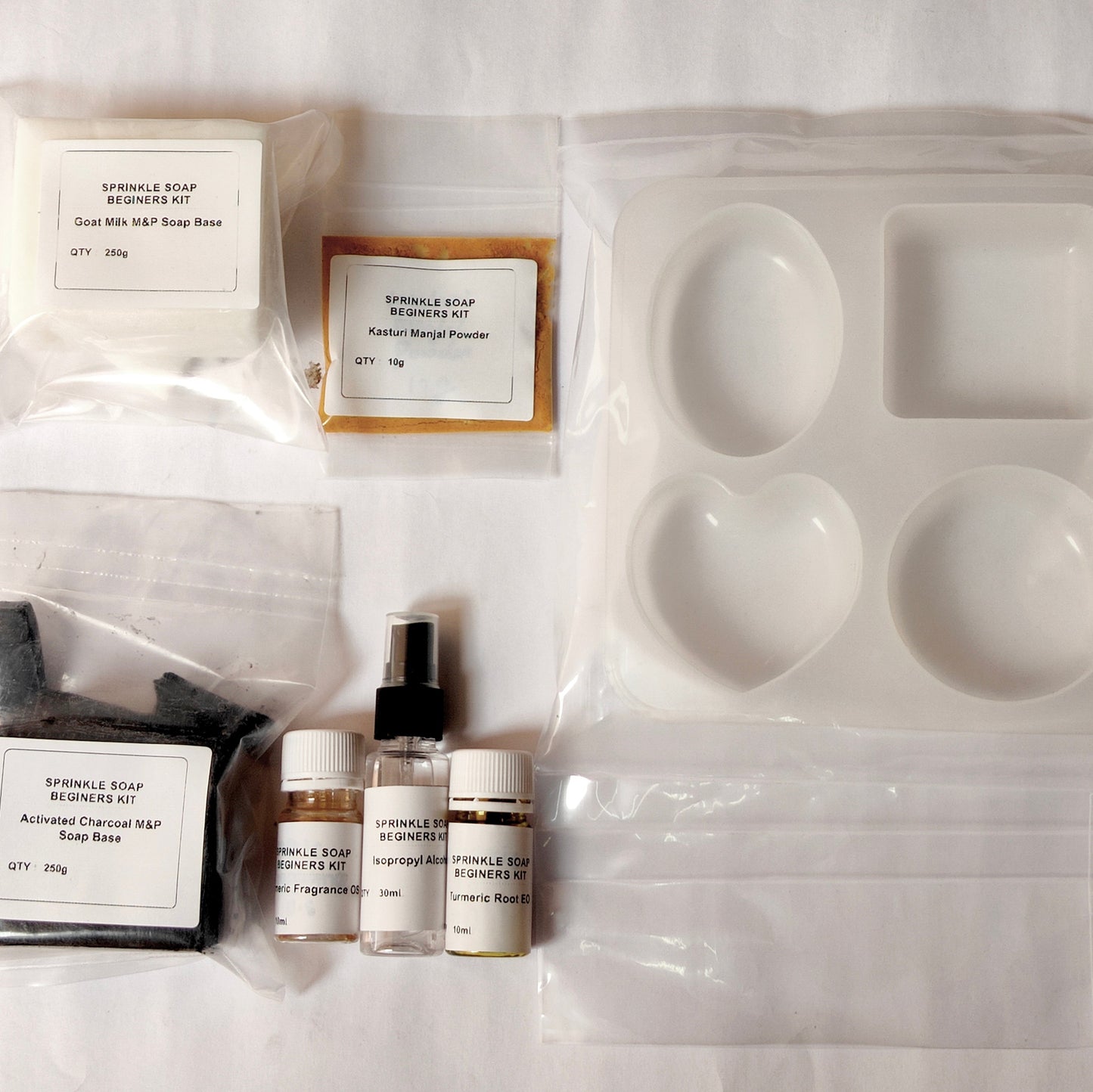 Spindle Soap Beginners Kit with various soap-making components on a white background