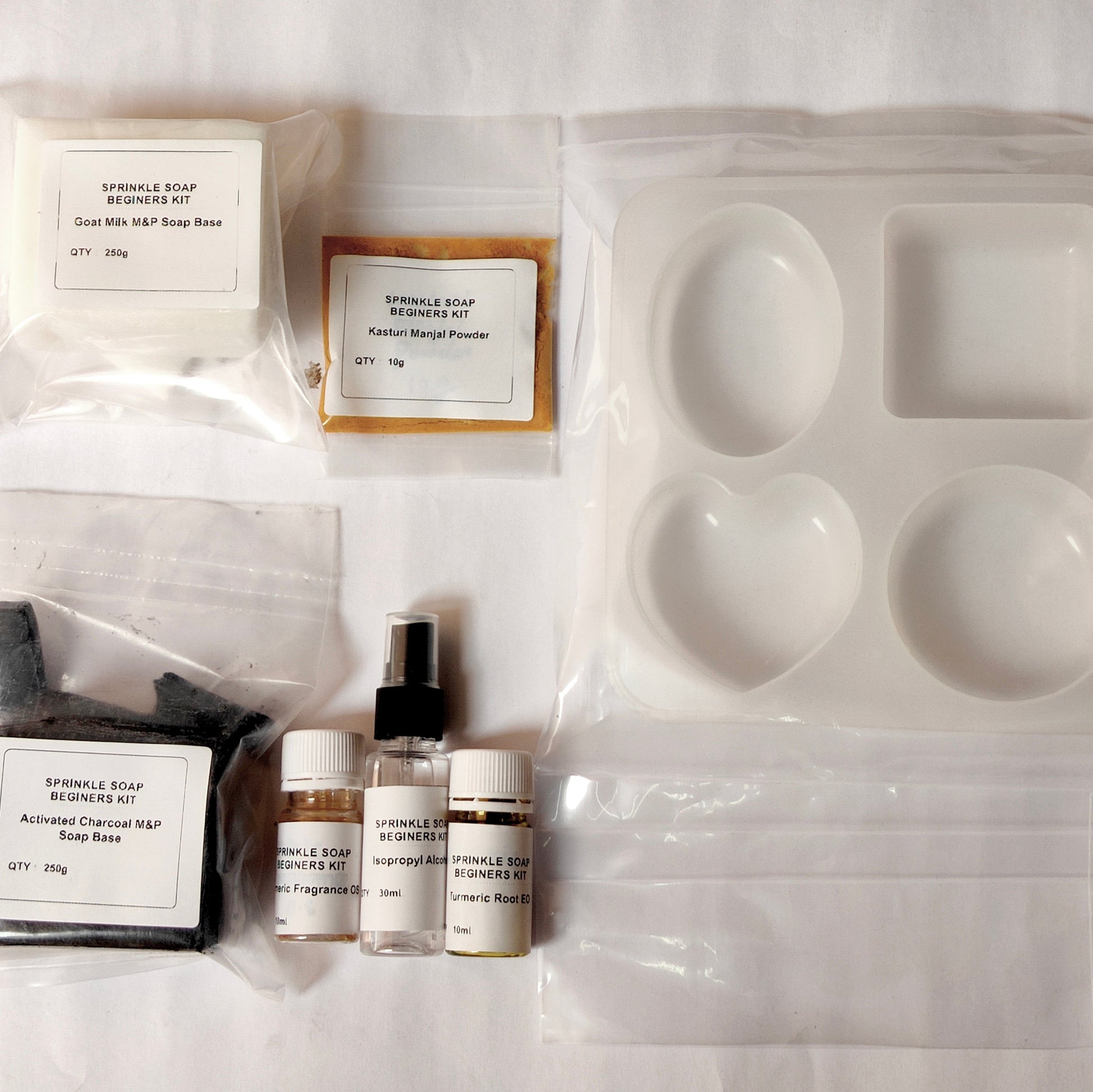 Spindle Soap Beginners Kit with various soap-making components on a white background